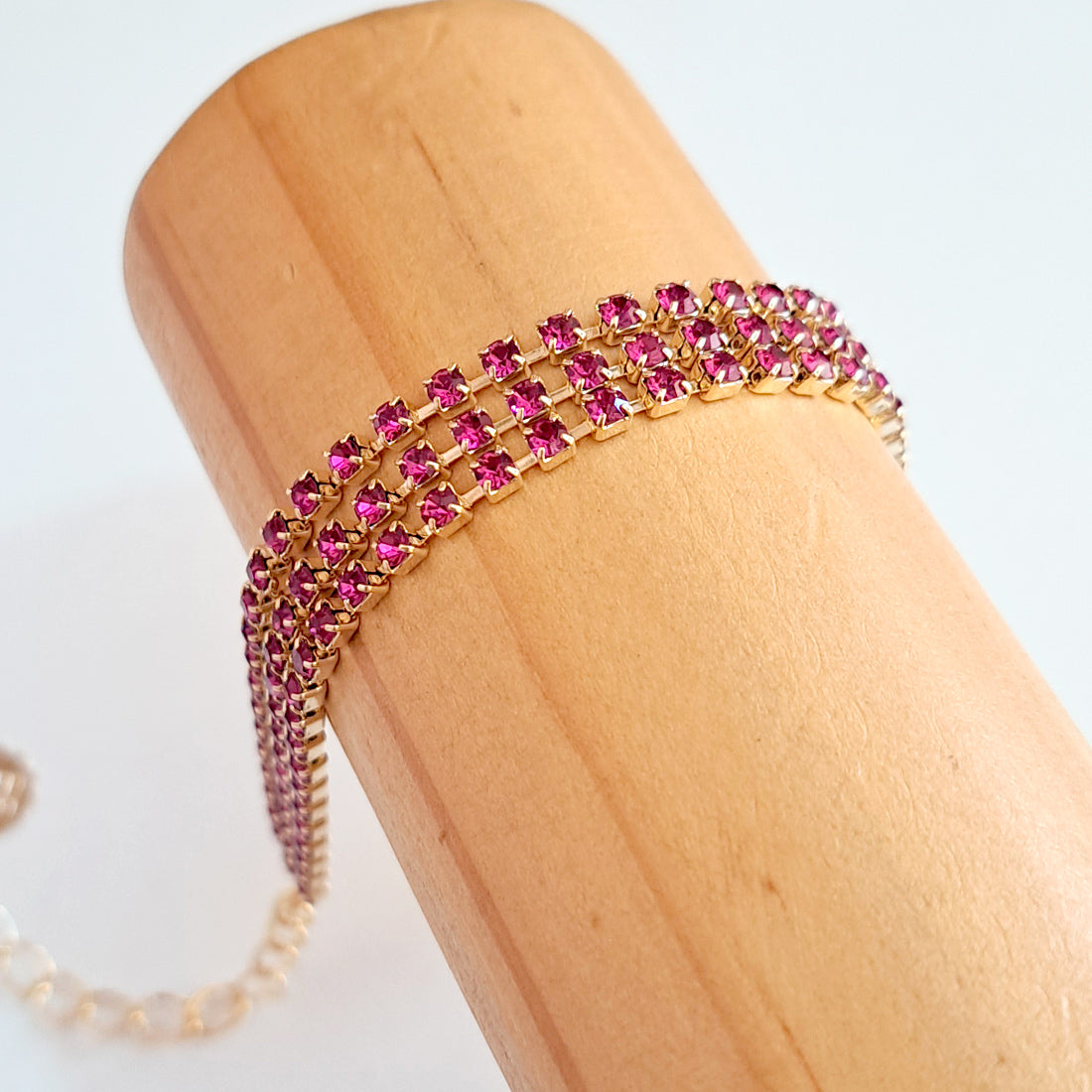 Pulseira dourada tripla strass rosa pink